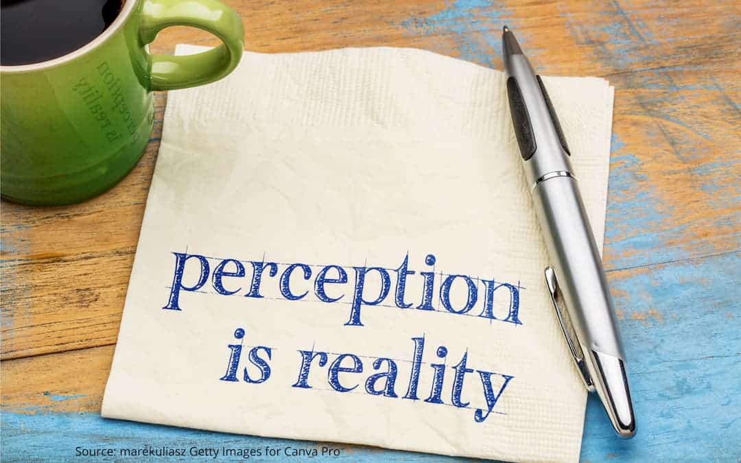 Napkin with the words "perception is reality" written on it to illustrate myths about cultural identity.